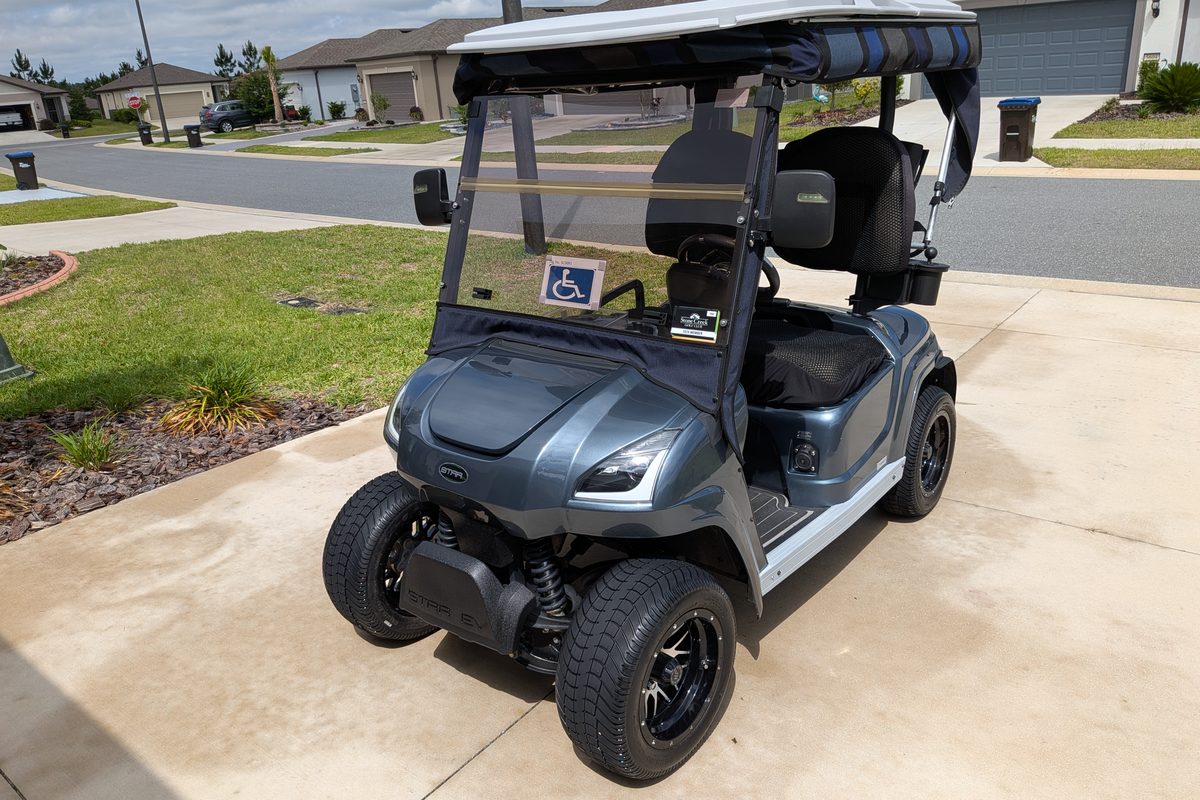 Wheelchair-accessible Star EV golf cart maintained on the Ocala Cart Care Plan