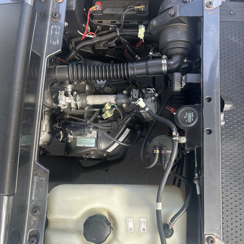 Gas golf cart engine bay serviced by Ocala Cart Care